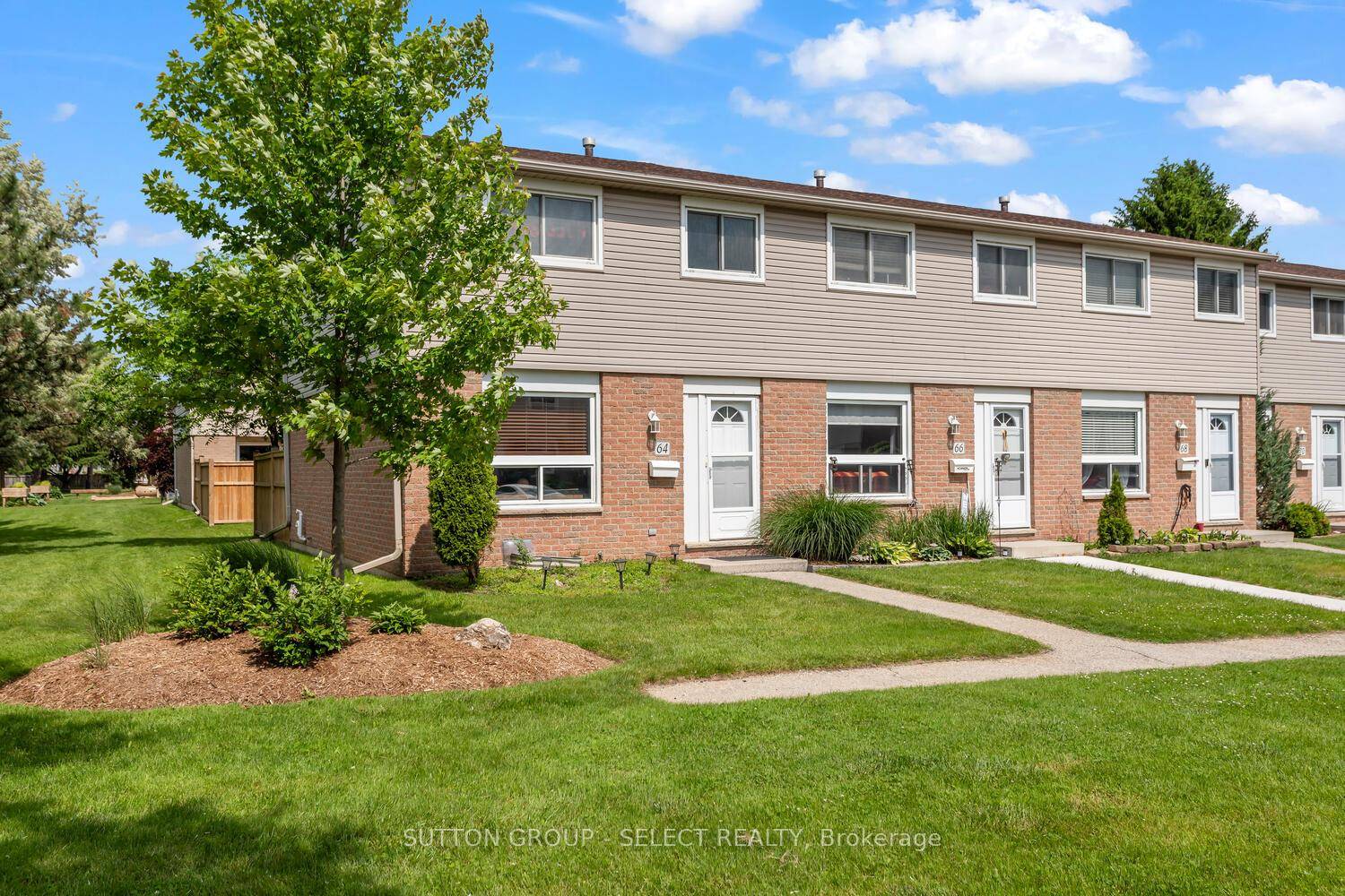 Welcome to this beautifully renovated townhouse, where modern comfort meets convenience !