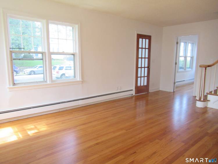IMMEDIATE OCCUPANCY ! RENOVATED, FURNITURE READY NORTH END HOME FEATURING HUGE LIVING ROOM WITH FIREPLACE, SPACIOUS NEW CUSTOM KITCHEN WITH DINING AREA.