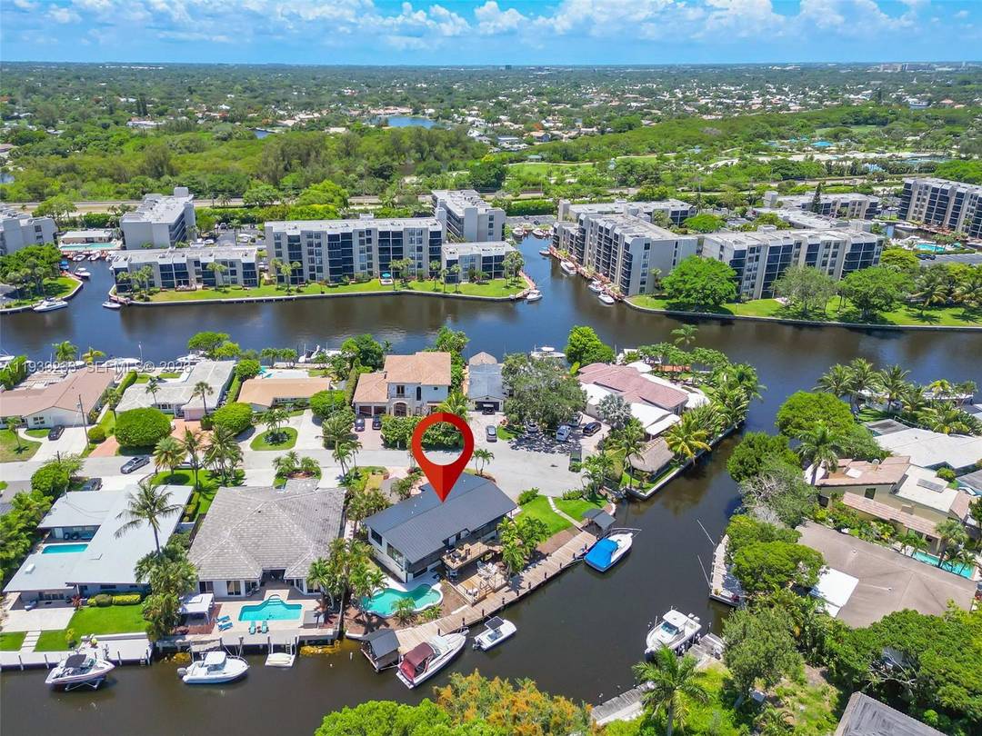 Live the ultimate South Florida waterfront lifestyle in this beautifully remodeled 5 bedroom, 4.
