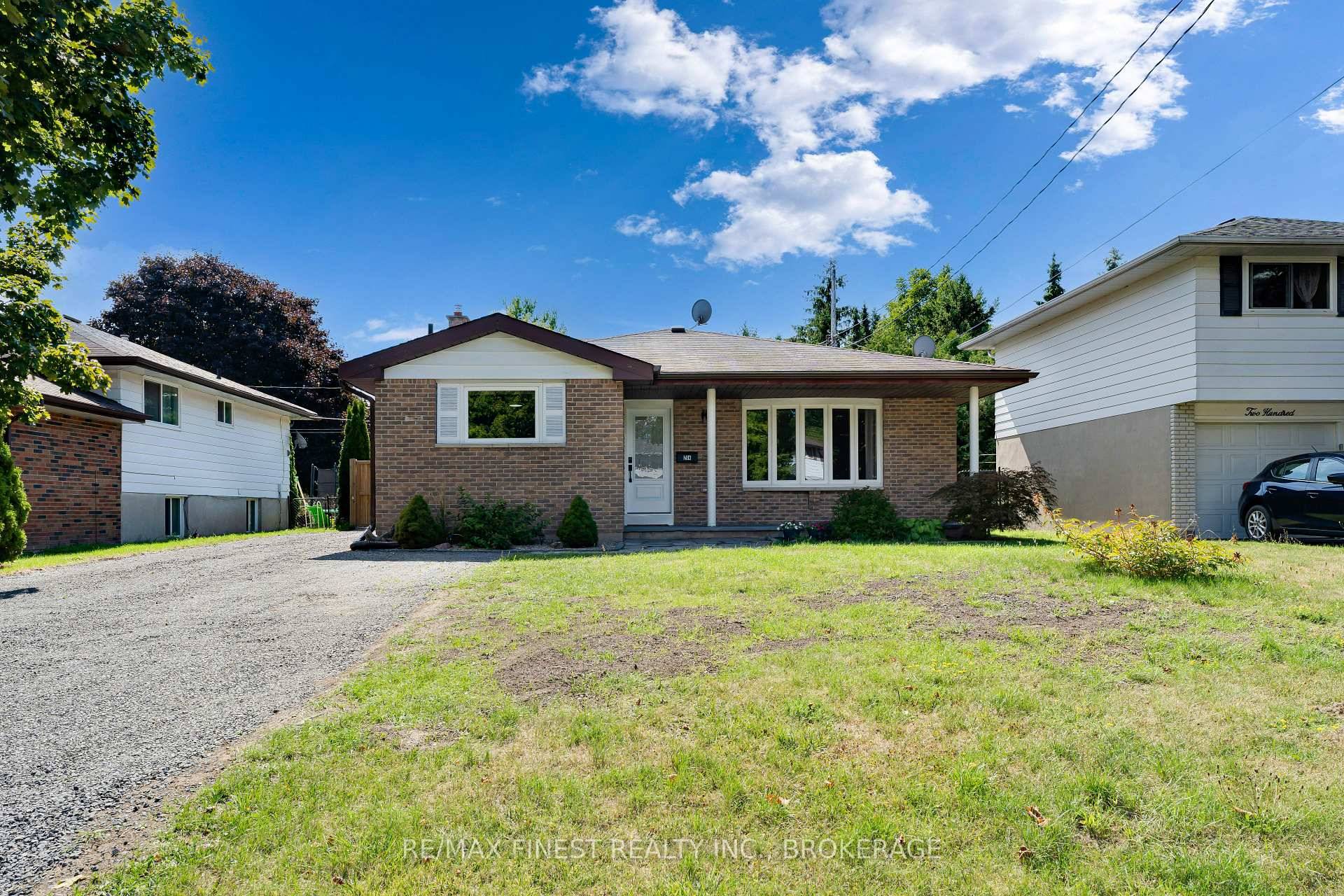 Beautifully Updated 3 Bedroom Backsplit with Walk Up Basement amp ; Oversized Backyard !