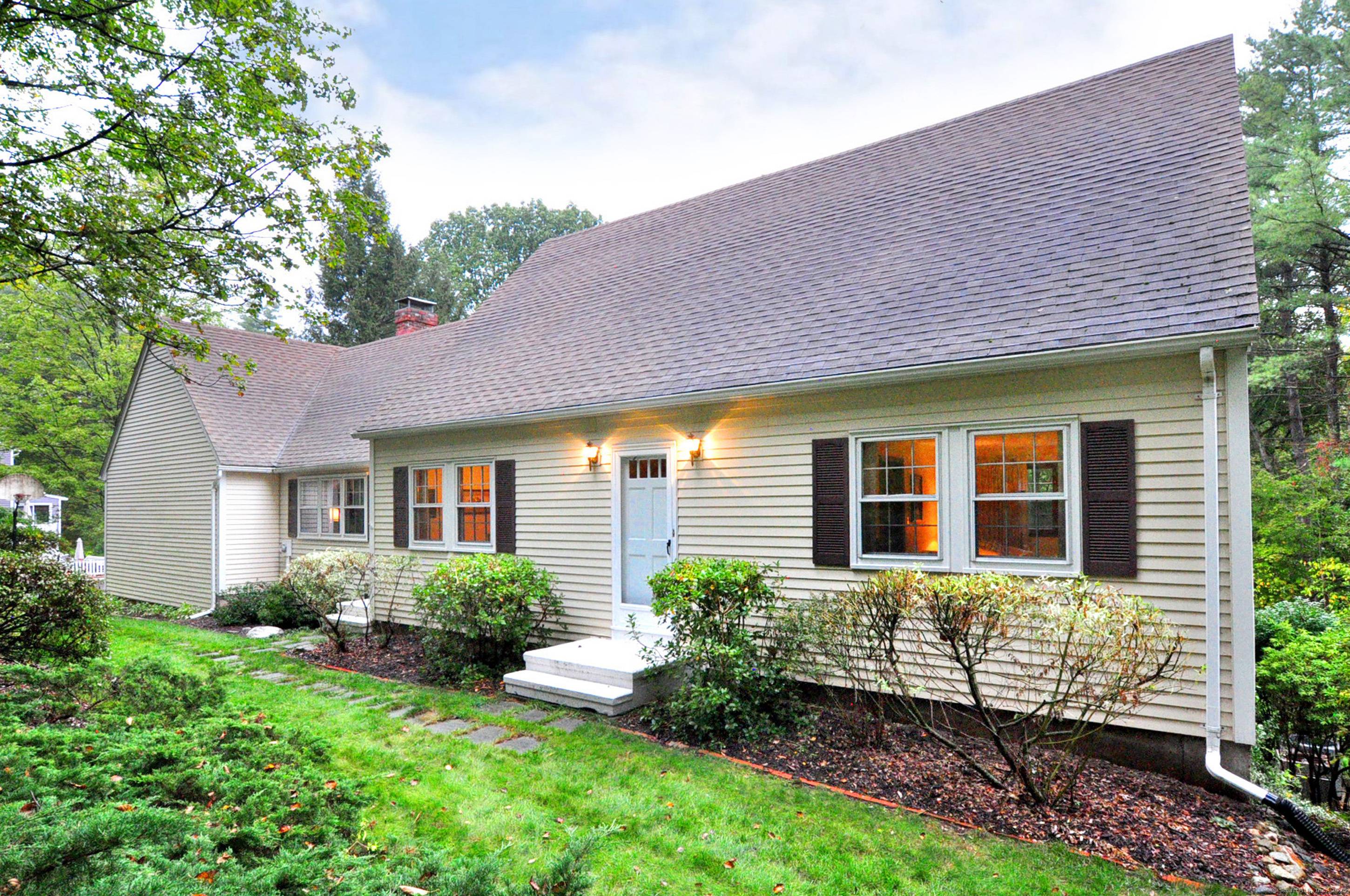 PRICE RREDUCED ! Discover this spacious and light filled 3 BR Contemporary Cape on a peaceful cul de sac in beautiful Canton Valley !