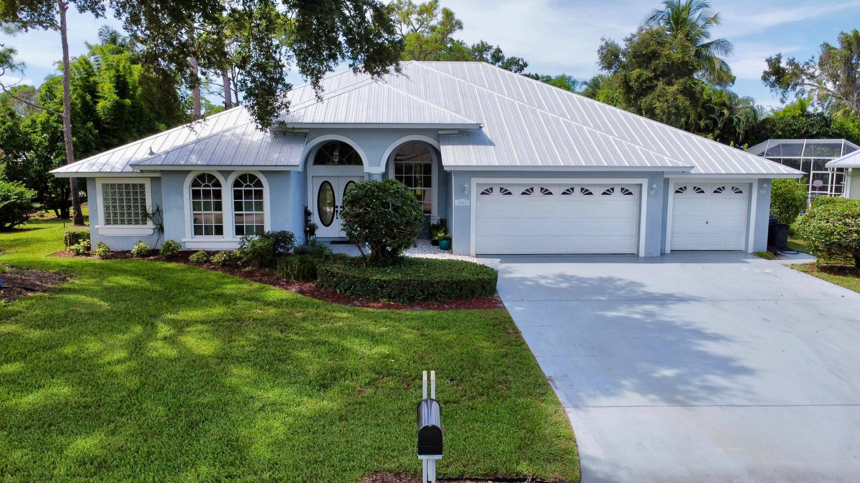 Live the ultimate Florida lifestyle in this beautifully appointed 4BR office 3BA waterfront pool home located in one of Palm City's most sought after communities.