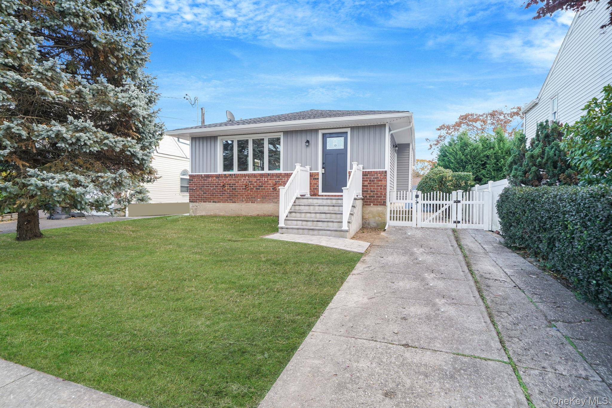 Beautifully renovated 3 bedroom ranch featuring a full basement and updated finishes throughout.