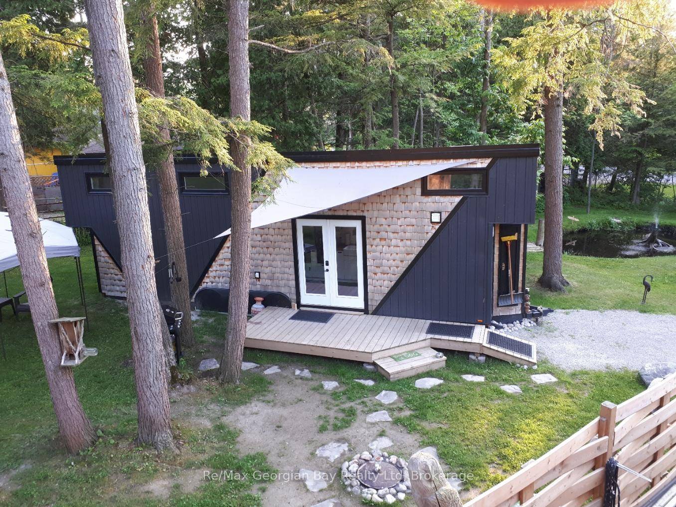 TINY HOME ONLY ! IT DOES NOT COME WITH THE LAND AND NEEDS TO BE MOVED TO YOUR OWN PROPERTY !