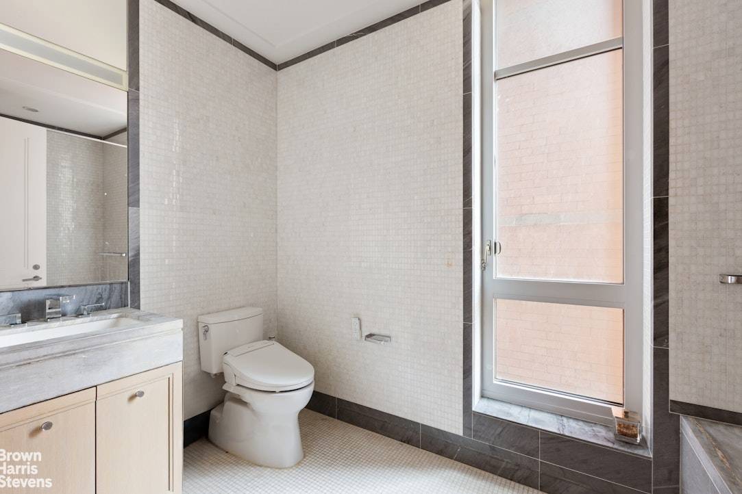 Welcome to Residence 8C at 200 East 95th Street, a light filled three bedroom, three bathroom home in the prestigious Kent condominium.