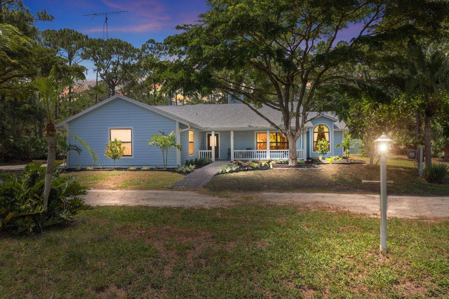 Conveniently located on a quiet road only one home off Sandy Run, this inviting country style home on 2.