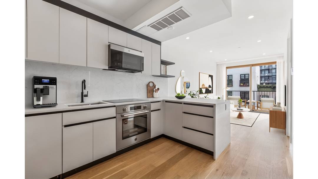 Pulaski Gardens is a newly constructed, seven unit boutique condominium set on a quiet, tree lined brownstone block in the heart of Bedford Stuyvesant.
