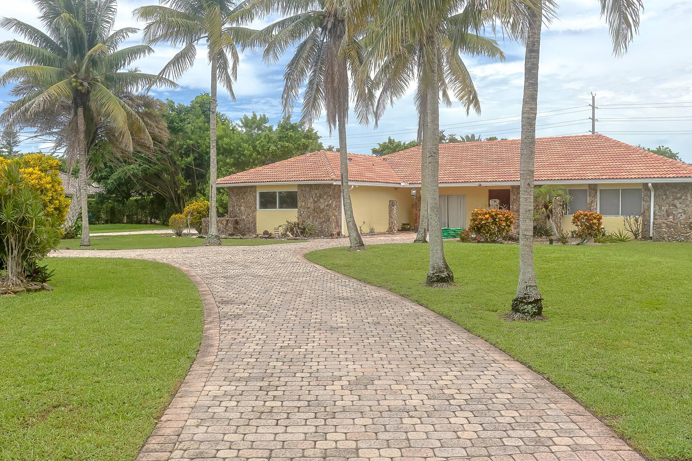 This beautiful home in Boca Raton, Florida offers the perfect blend of space, comfort, and Florida charm !