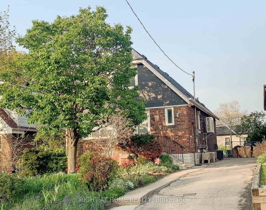 Beautifully Updated Rental On Lower Level With Separate Side Entry That Leads Into The Open Concept Living Kitchen Room.