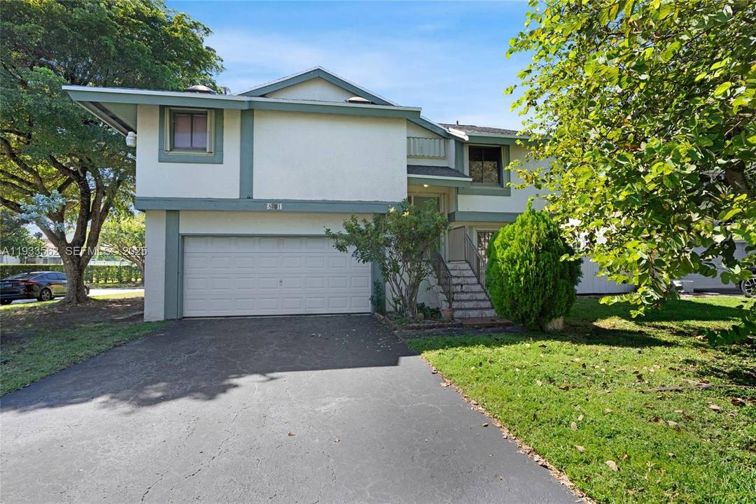 Located in the charming Seagrape community, this home offers an excellent open layout and a perfect canvas to modernize and add value.