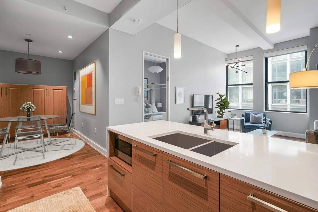 Welcome to this beautifully crafted one bedroom residence, thoughtfully designed with both style and versatility in mind.