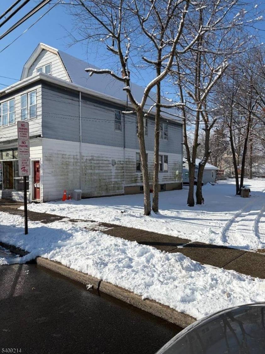 This property needs complete rehab presenting great possibilities for investors and owner occupied with 2 apartments and a store front for bus or office.