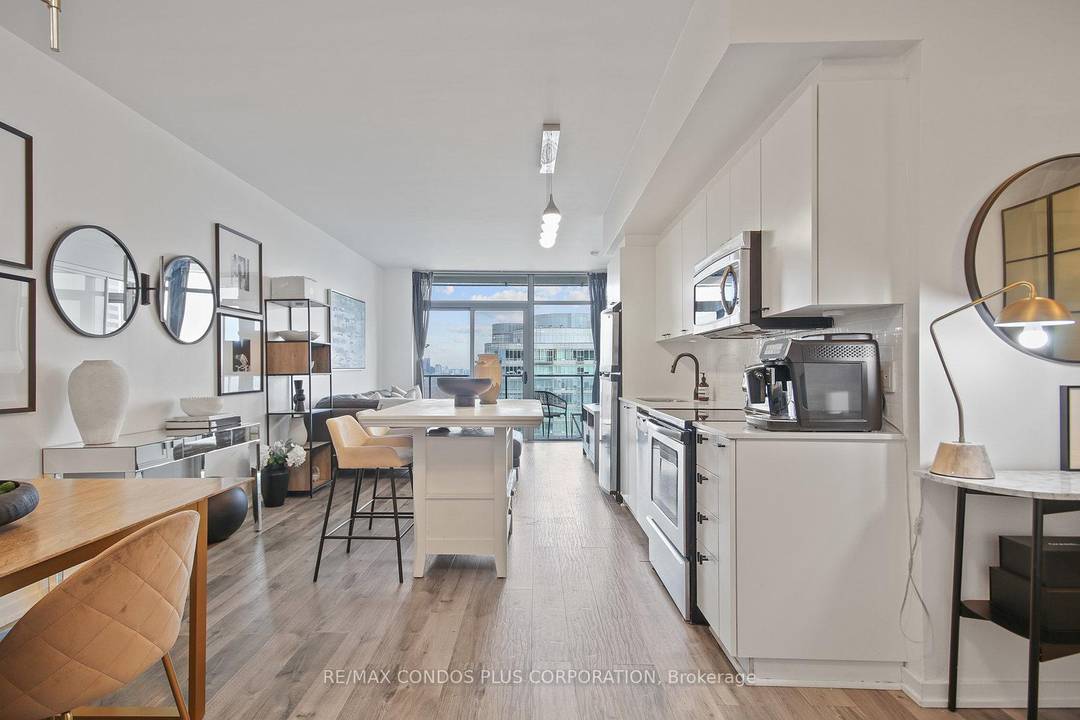 FURNISHED 1 den condo that hits the sweet spot between waterfront calm and downtown convenience.