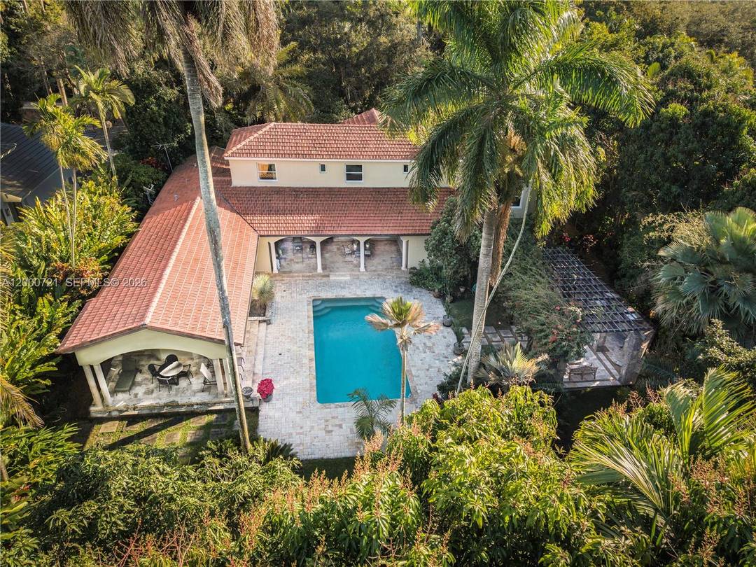 Set in coveted Ponce Davis, this exceptionally maintained estate delivers elevated comfort and peace of mind infrastructure.
