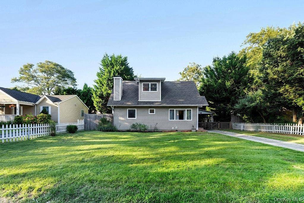 Welcome to this charming 4 bedroom, 2 bath home nestled in the heart of Hampton Bays.
