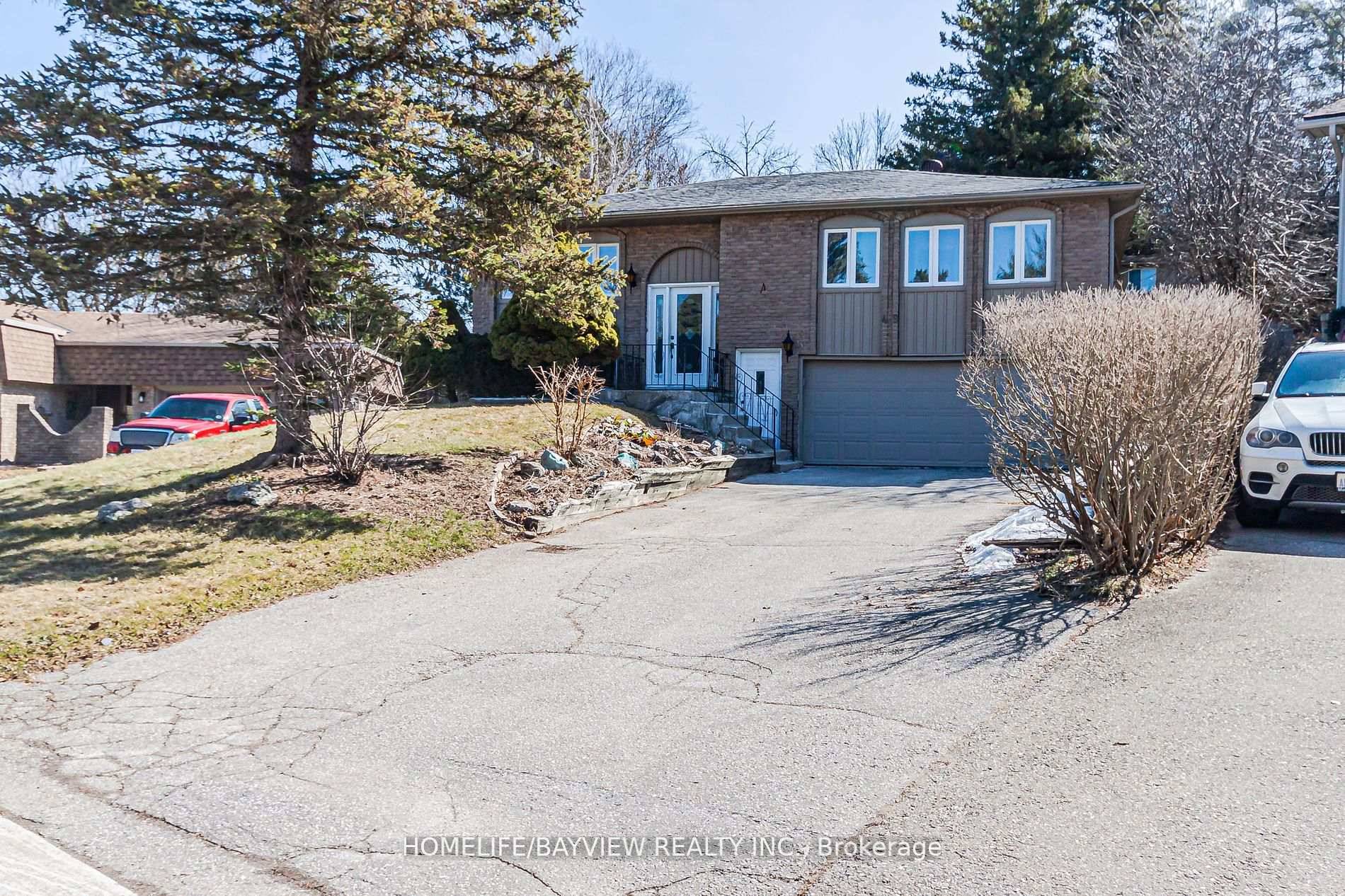 Good Opportunity. Raised Bungalow on a quiet Cul De Sac with an oversized Pie Shaped Lot giving you a lot of privacy in a Forest Like Backyard.