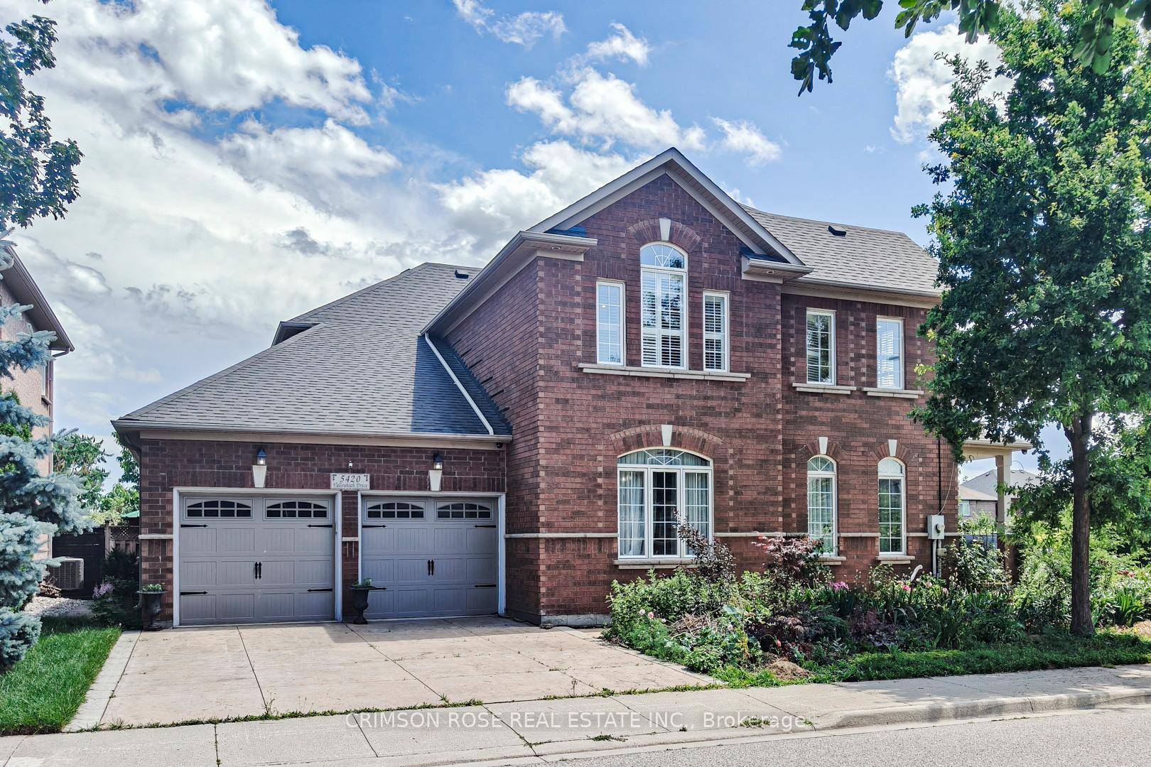 A charming, bright and spacious Orchard home backing onto park, just a few houses away from Bronte Creek Trail.