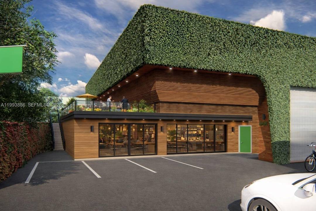 A warehouse style commercial space, fully fitted for food service use and ready to operate as a restaurant, featuring key infrastructure already in place.