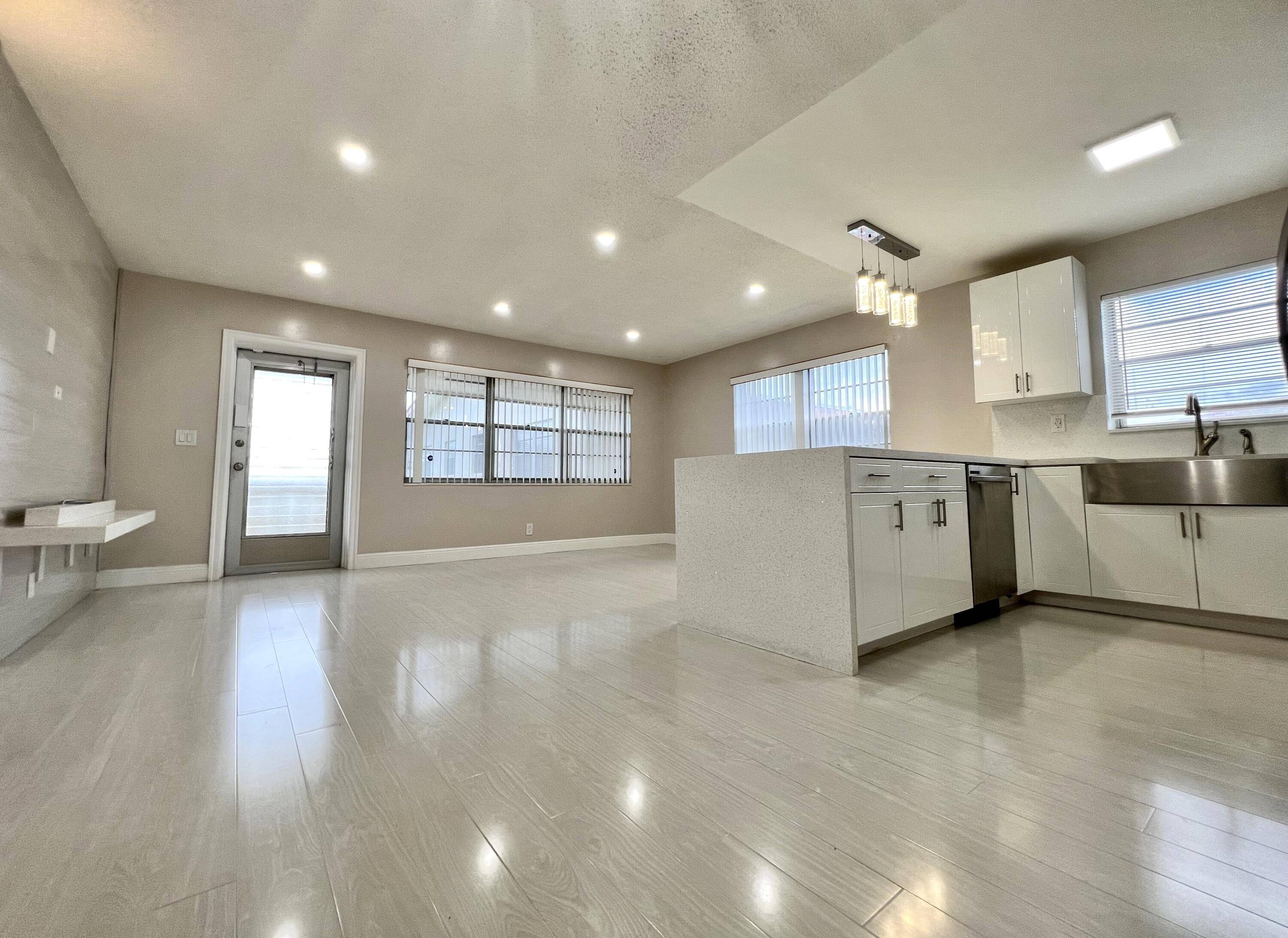 Stunning Updated CORNER Condo in 55 Century Village !