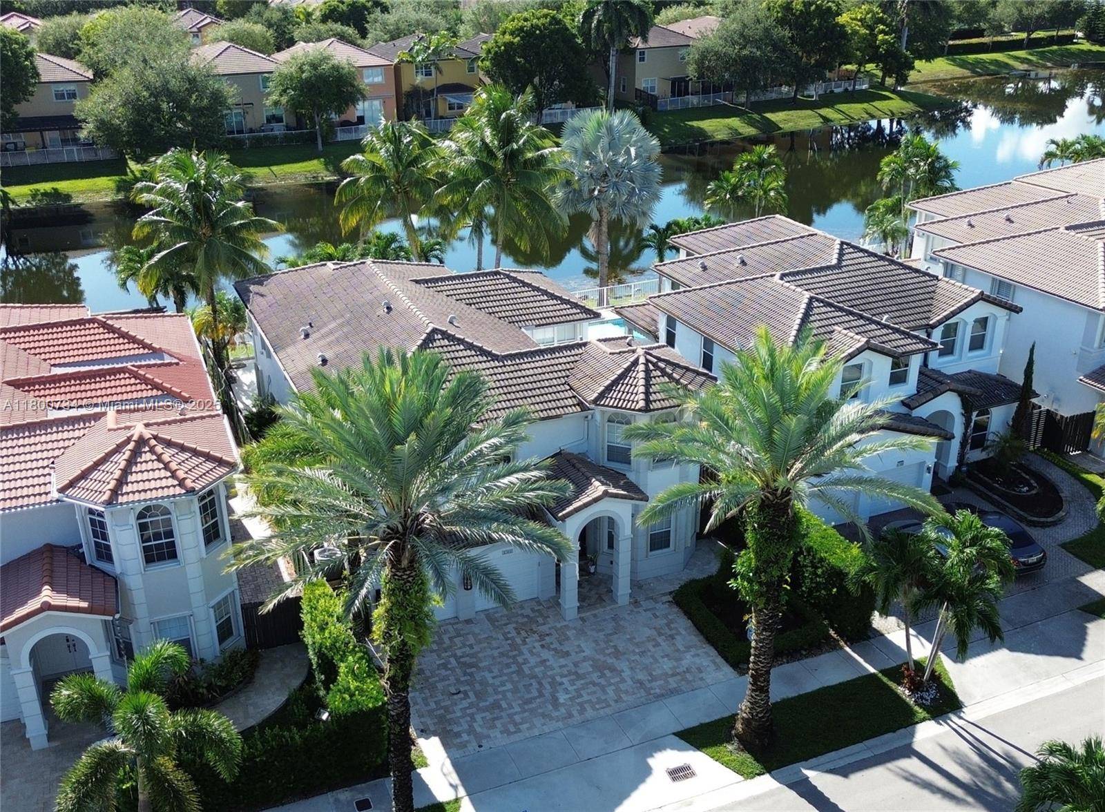 Experience upscale living in the prestigious Islands at Doral !