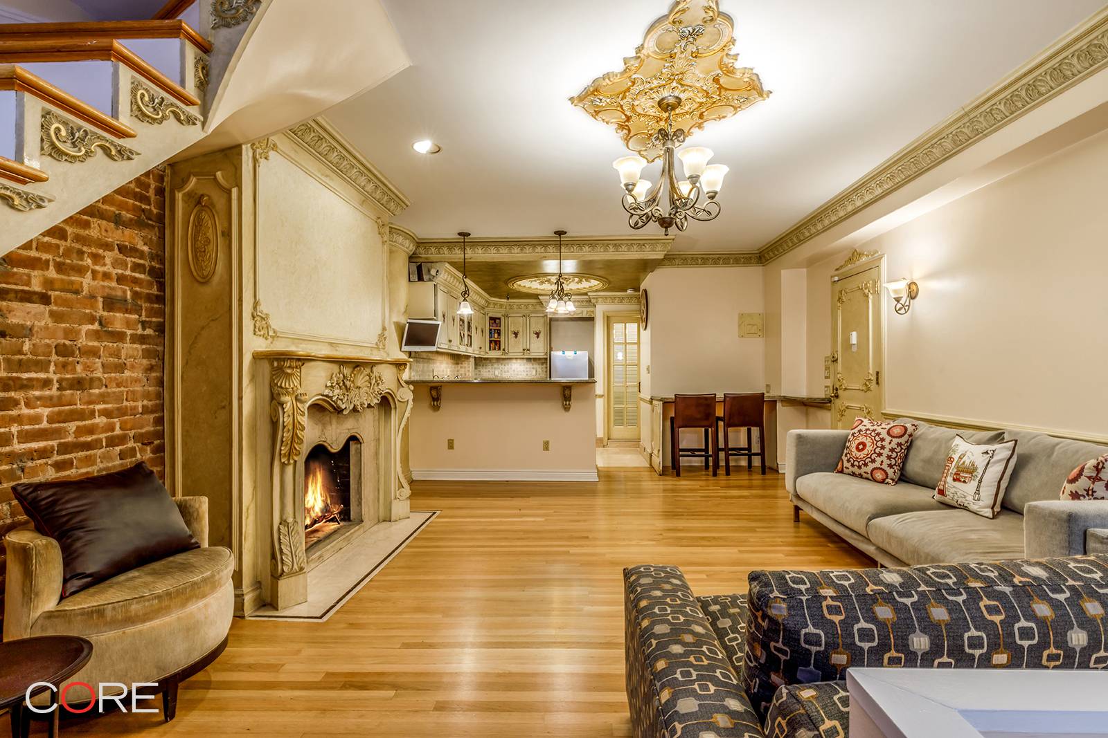 Welcome to this rarely available garden level duplex with one and a half bathrooms located in a historic townhouse in Midtown South's Murray Hill District.