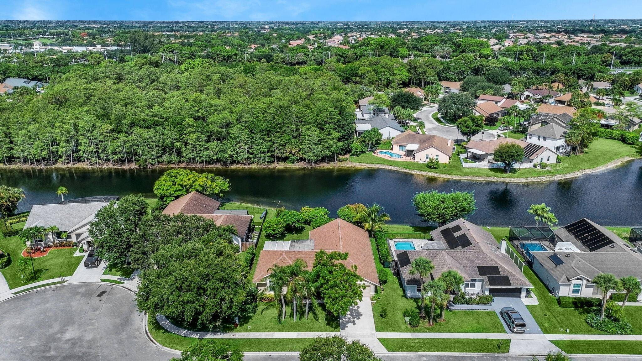 Lakeside living with scenic views in highly desired Woods Walk !