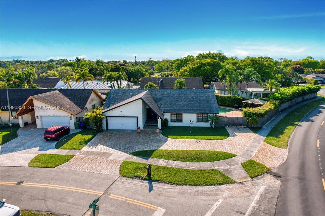 Beautifully updated corner lot home located in the highly sought after Calusa neighborhood in the heart of Kendall.