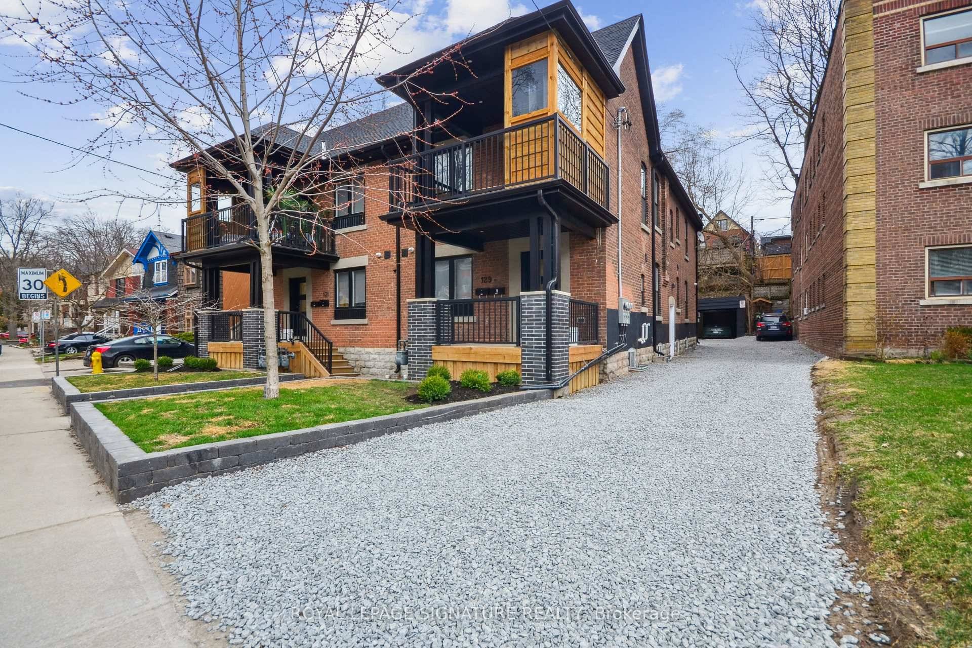 Spacious and updated 3 bedroom, 2 bath main floor unit in a charming triplex in the heart of The Beaches.