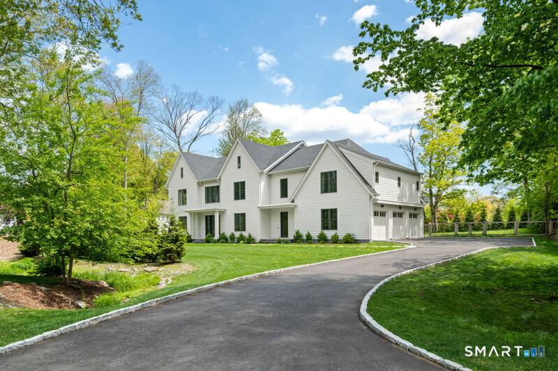 Stunning modern transitional home built by Compo Luxury Homes in 2024 and ideally located just minutes to downtown Westport, Compo Beach, and the train.
