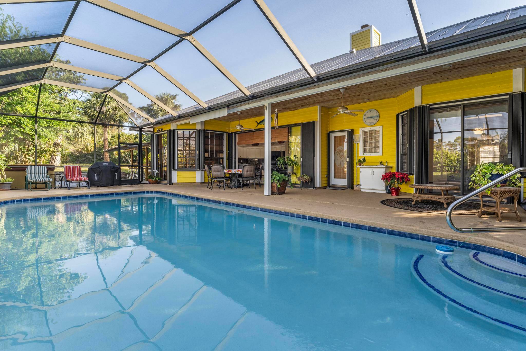 Tucked away in the sought after Rocky Point community, this stunning 4 bedroom, 3 bathroom pool home offers the perfect blend of comfort and coastal charm.