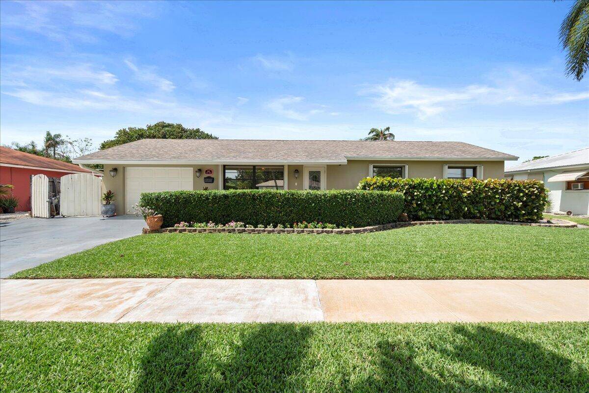 Welcome to your dream home in the heart of Village of Palm Springs, Florida where charm, comfort, and convenience collide !