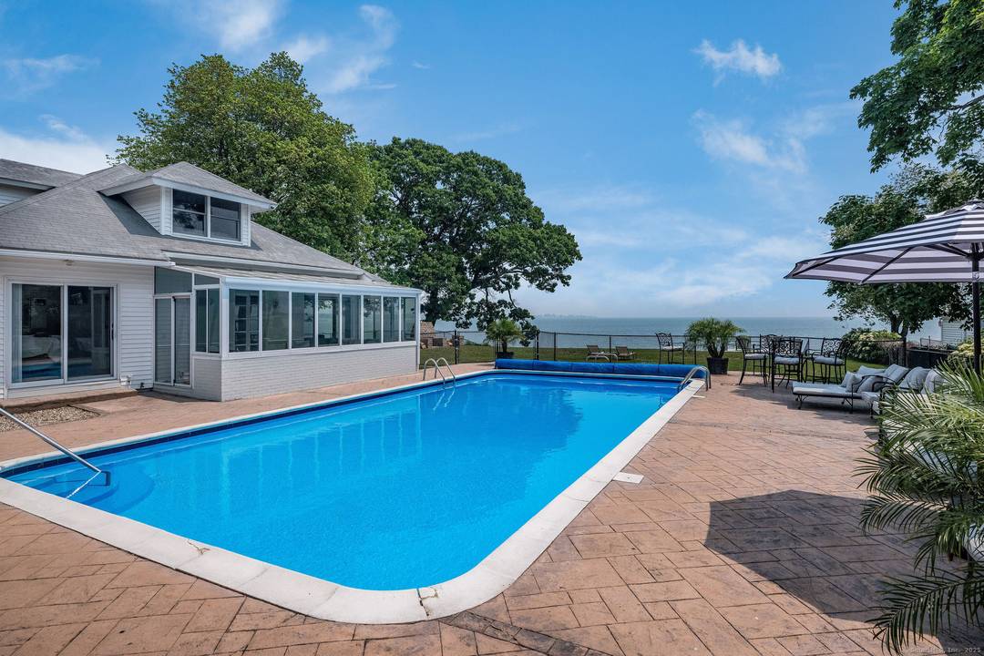 Welcome to Westbrook. This stunning waterfront home has been thoughtfully updated and is designed to make the most of seaside living.