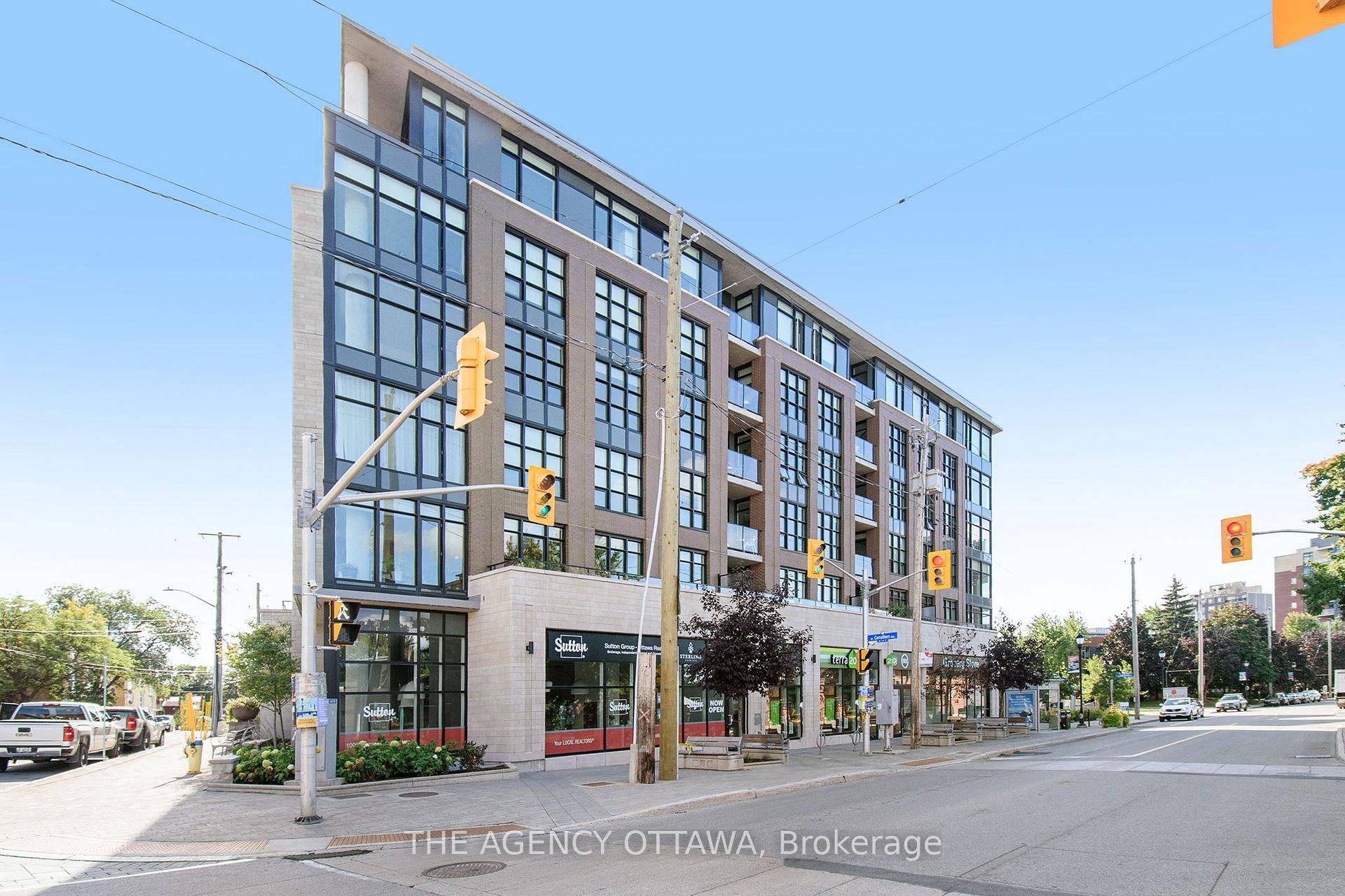 Discover this impressive and PRIME retail corner unit featuring expansive windows and soaring 15 foot ceilings, providing exceptional street level exposure perfect for walk in business.