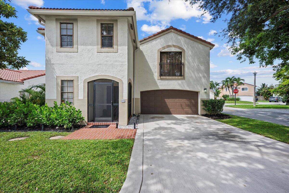 Nestled in the Wellington Lakes community, this beautifully updated 4 bedroom, 2.