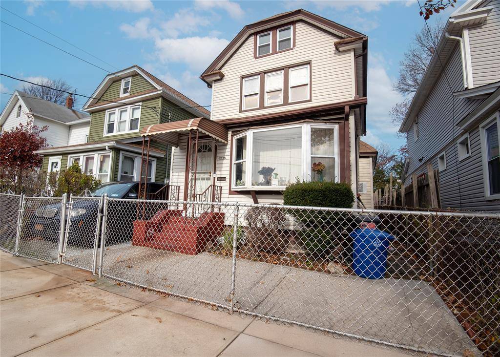 Three bedroom Colonial on a quiet, tree lined Street !