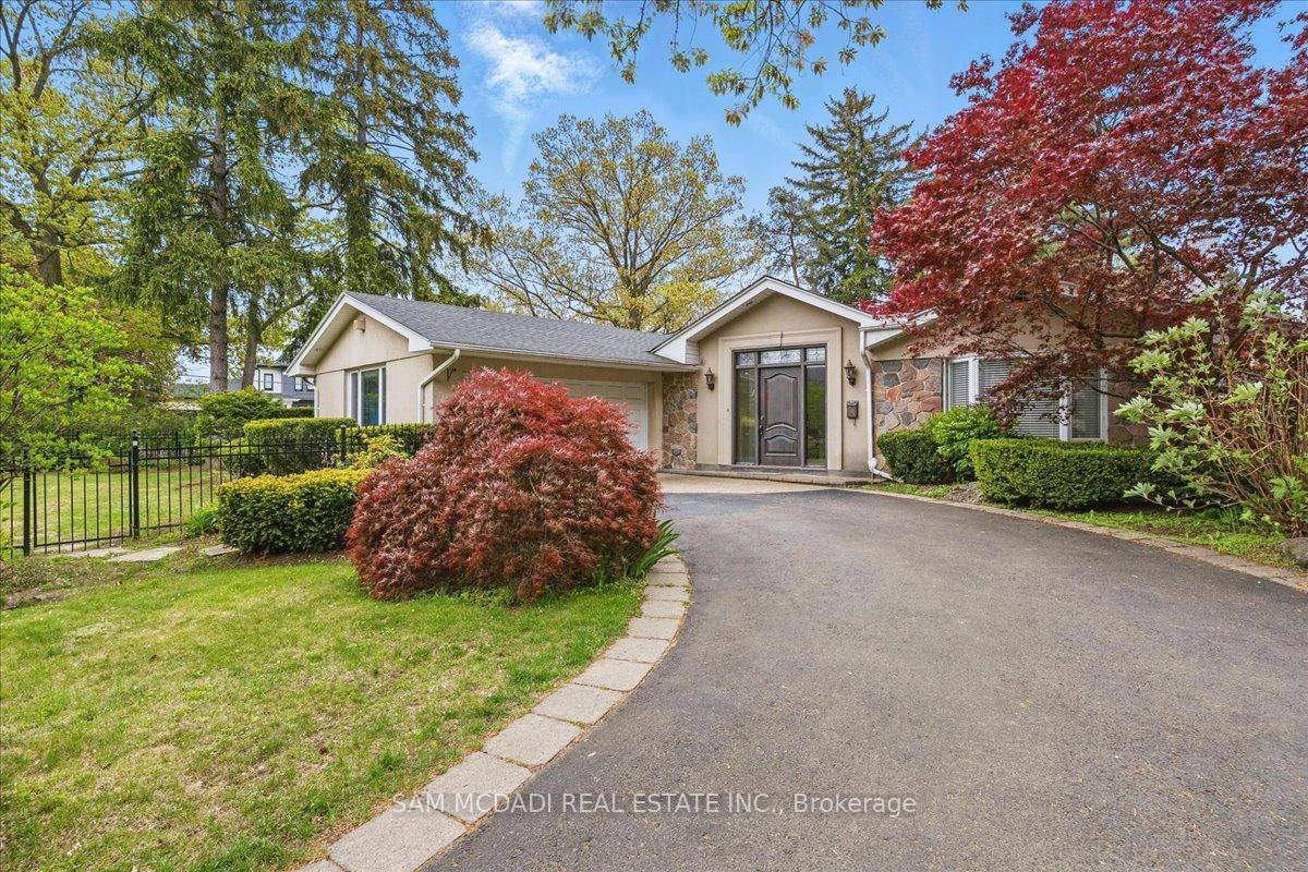 Limitless Opportunity for a Charming Bungalow on a Massive Lot in Prestigious Gordon Woods !