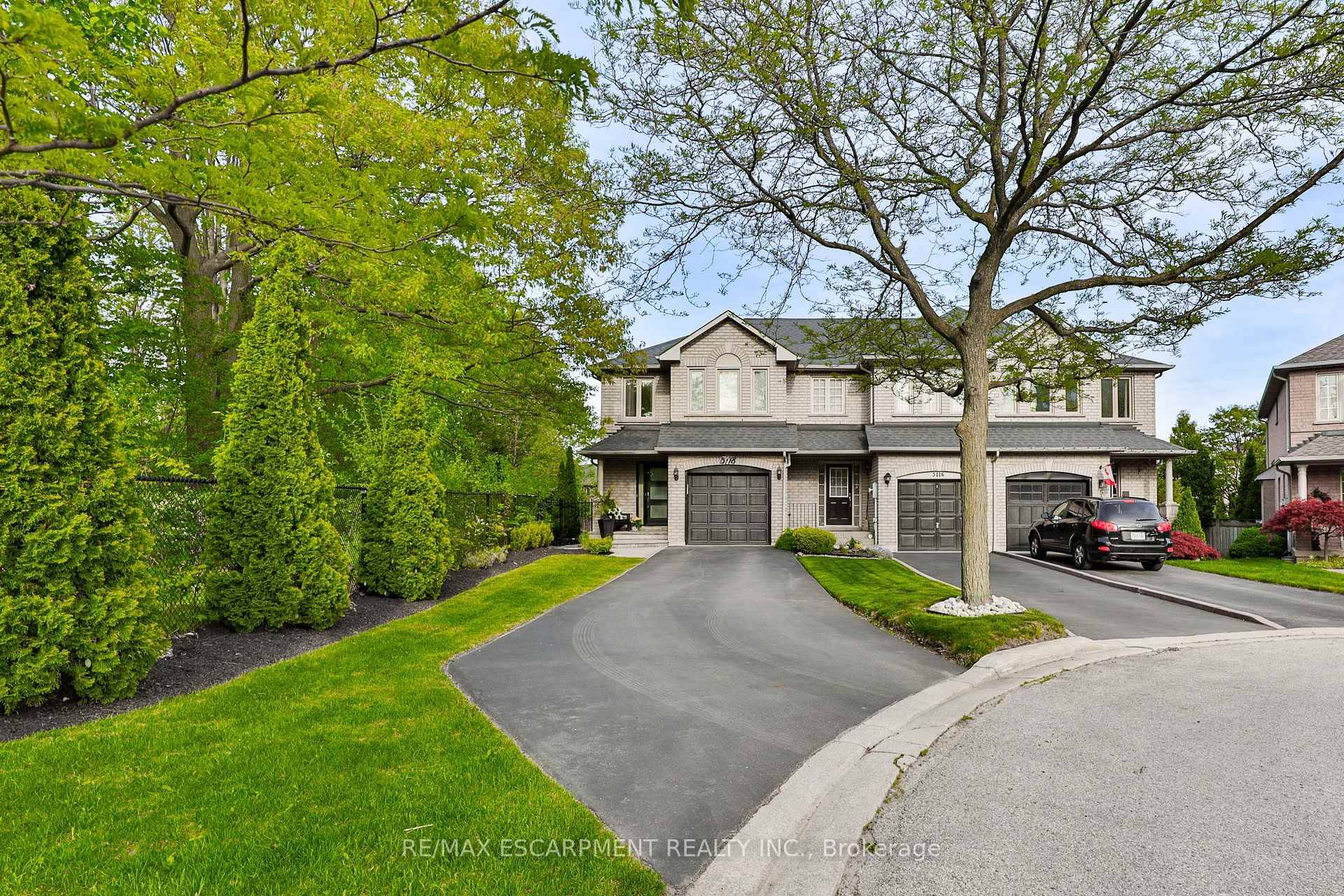 Welcome to 5188 Tree Court a beautifully renovated gem nestled on a quiet, family friendly court in desirable North Burlington.