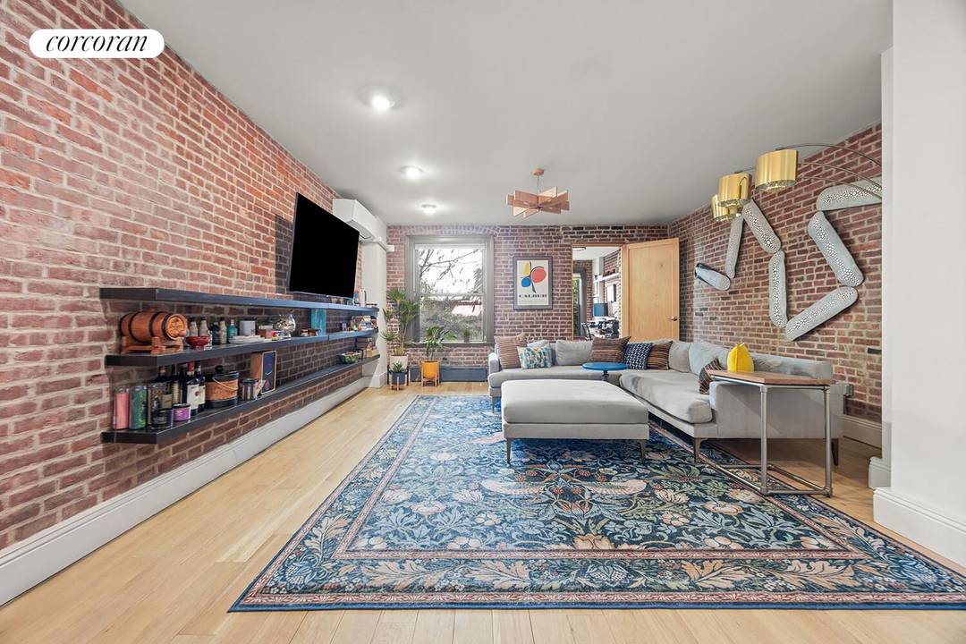 Welcome to this beautifully appointed duplex condo in the heart of Central Harlem, where space, character, and modern convenience come together seamlessly.