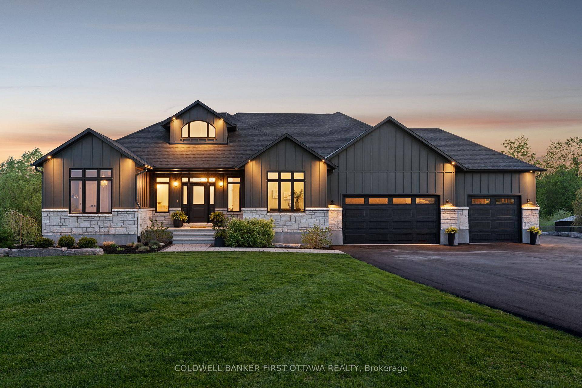 Experience exceptional living in this stunning, custom built home offering sleek, modern finishes on nearly 2 acres of open, usable land.