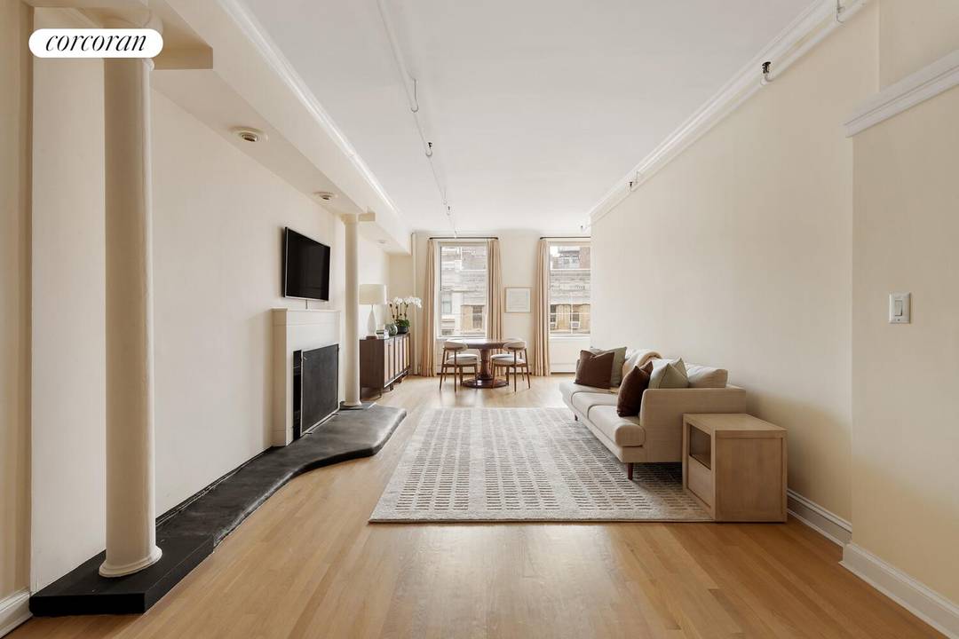 This bright, sophisticated SoHo loft is located on one of the most desirable blocks on West Broadway between Prince and Spring.