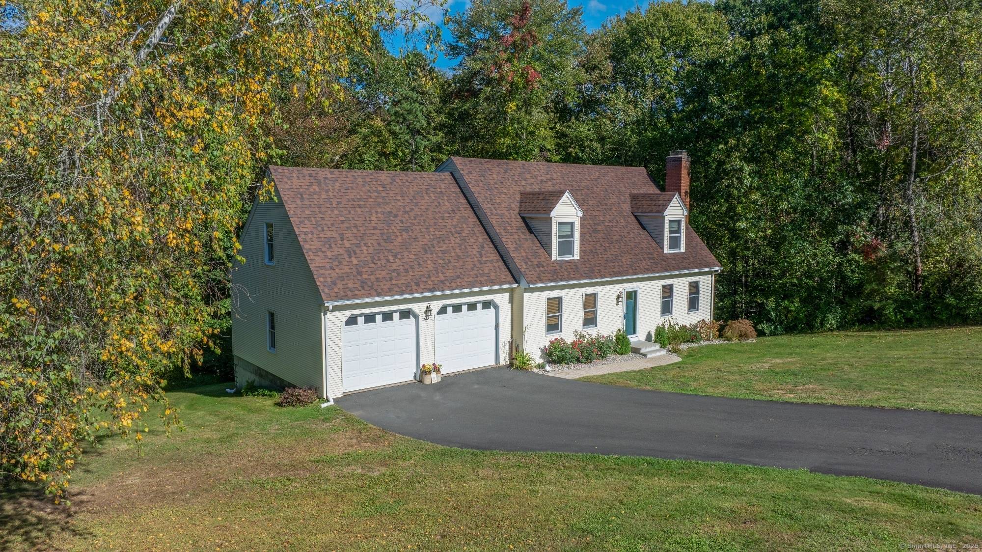 Classic New England Cape located on one of most picturesque roads in Coventry, offering close to 4 acres of privacy, just 13 minutes to Uconn, 6 minutes to Coventry Lake ...