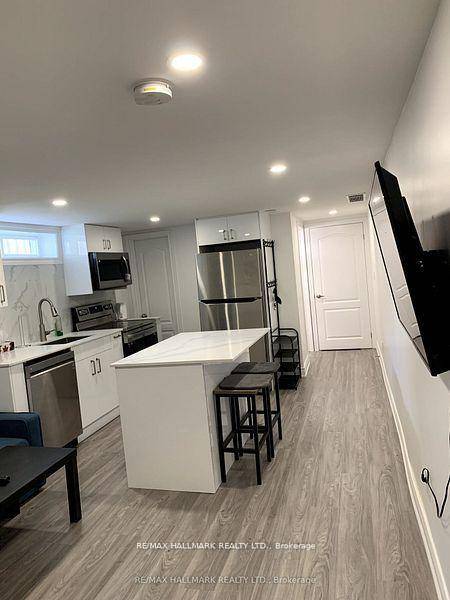 Renovated, fully furnished 1 bedroom basement apartment with private laundry.