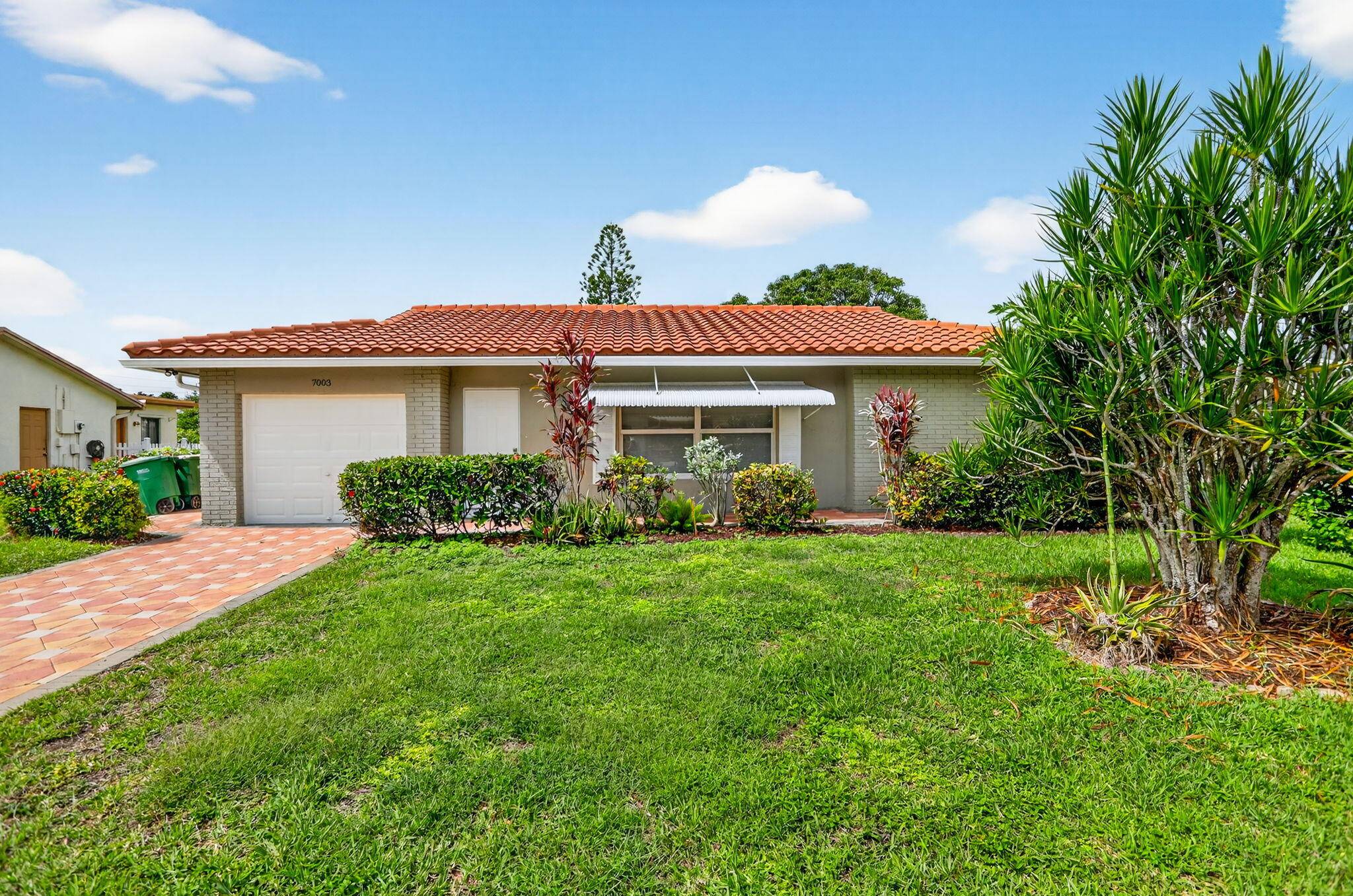 Beautifully updated home in Westwood 4 of Tamarac, a desirable 55 community.