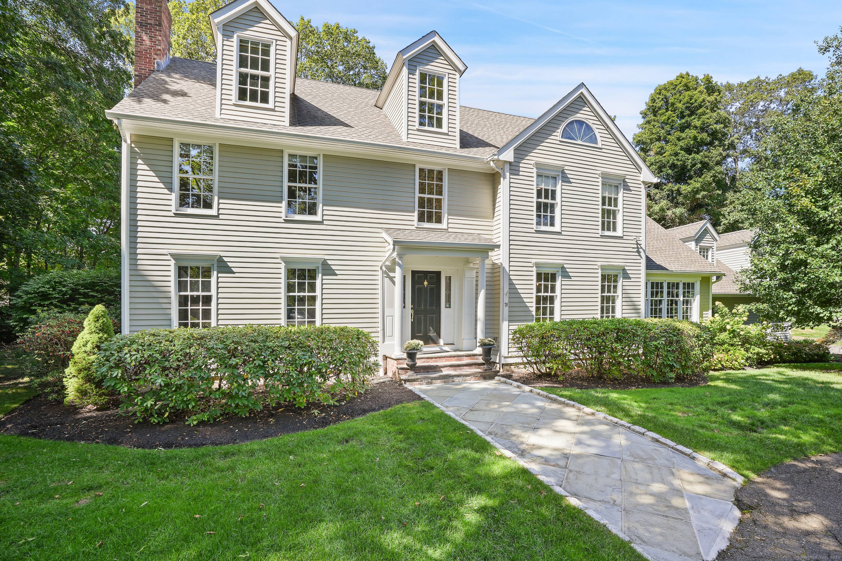 This sophisticated Colonial at 70 Branchville Road offers over 5, 000 square feet of beautifully designed living space on 1.