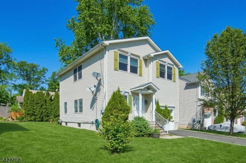 Sun drenched, sophisticated, and situated on a premium, quiet cul de sac !