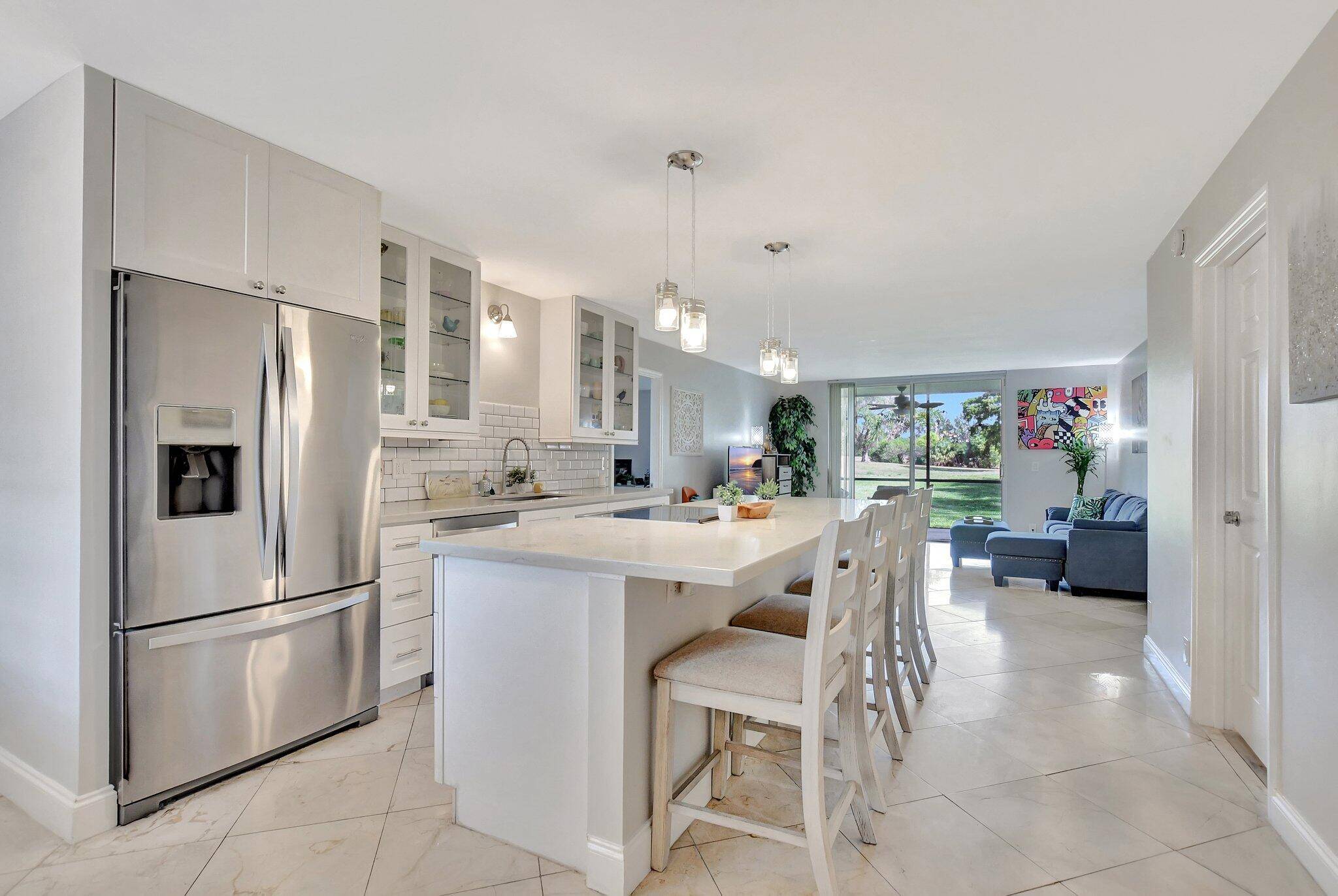 Welcome to this beautifully updated end unit condo, ideally located about 10 minutes from the beach !