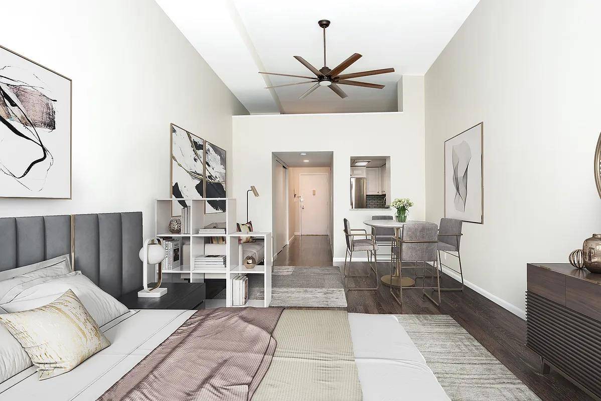 Newly renovated, spacious duplex loft with a sprawling 27 ft long living room which enjoys a flexible layout with southern exposure !