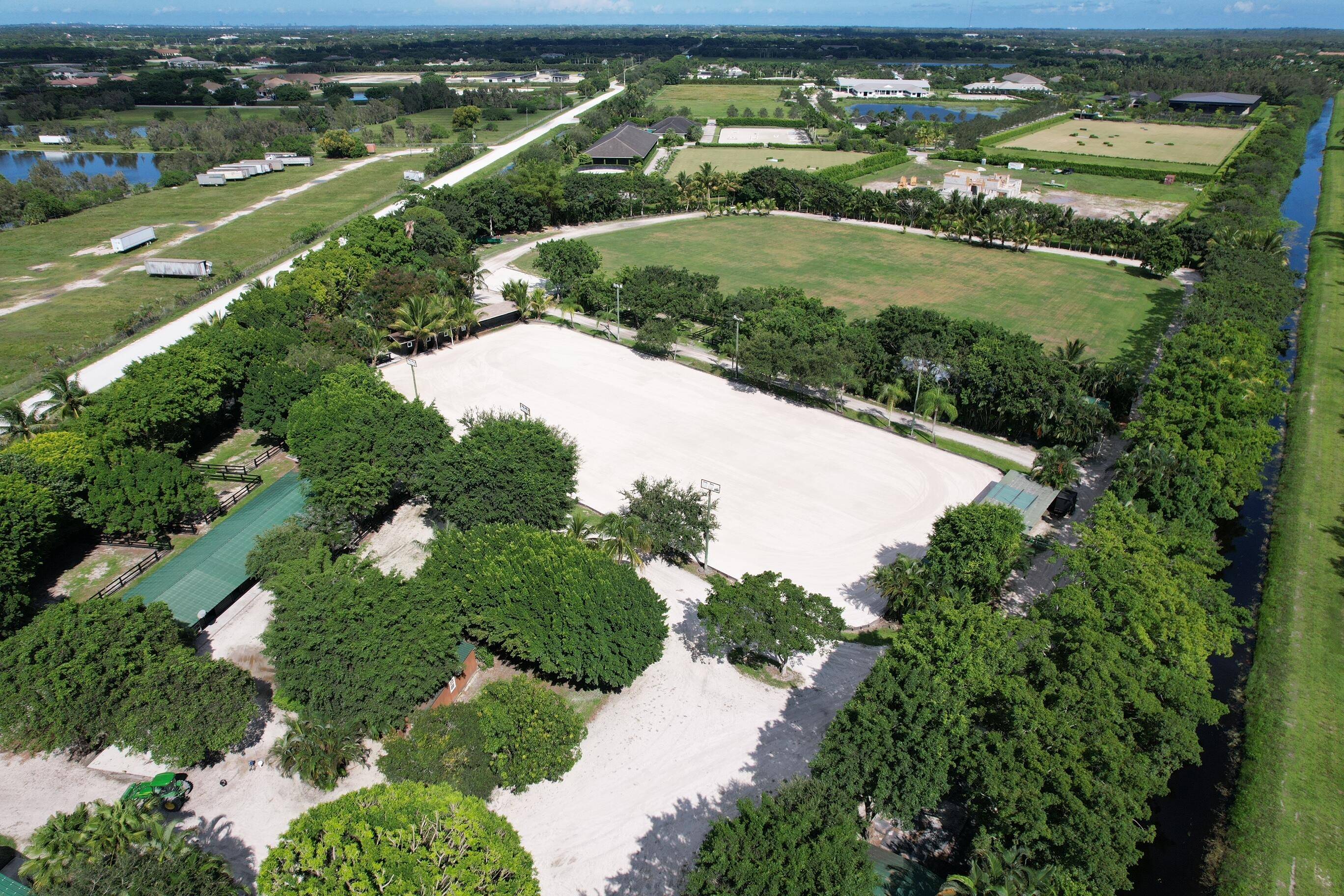 This fully functional polo farm offers multiple barns with 12 20 stalls each.