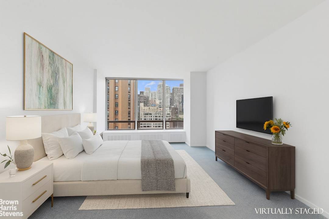 Welcome to 15E at the iconic 860 United Nations Plaza, a sprawling 3 bedroom 3 bathroom home with striking open city views, exceptional light, and endless potential.