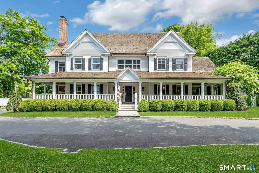 The moment you step onto the inviting front porch, you'll feel the warmth and charm of this exceptional 5 bedroom, 4.